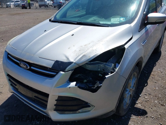 2016 Ford Escape Titanium with VIN 1FMCU9JX6GUB80715, listed as a IAAI auction lot 42060305 with 132,951 mi miles and . Bid and sale history available at DreamBid. Image 6.