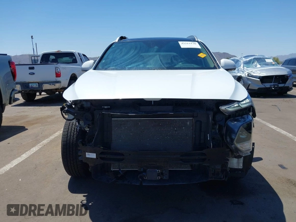 2020 Hyundai Santa Fe Limited with VIN 5NMS5CAD8LH209374, listed as a IAAI auction lot 42212130 with 32,378 mi miles and . Bid and sale history available at DreamBid. Image 6.