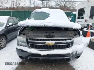2010 Chevrolet Suburban LS with VIN 1GNUKHE37AR203811, listed as a IAAI auction lot 41304431 with Not provided miles and . Bid and sale history available at DreamBid. Image 11.