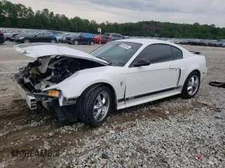 2003 Ford Mustang Premium Mach 1 with VIN 1FAFP42R43F453425, listed as a Copart auction lot 63959304 with 108,384 mi miles and Salvage title. Bid and sale history available at DreamBid. Image 1.