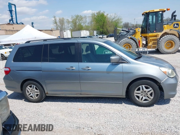 2007 Honda Odyssey EX with VIN 5FNRL38457B042912, listed as a IAAI auction lot 41992847 with 194,822 mi miles and . Bid and sale history available at DreamBid. Image 13.