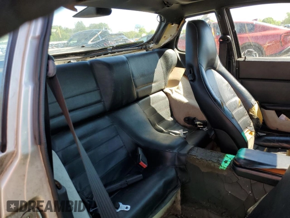 1986 Porsche 944 z VIN WP0AA0954GN155776, wystawiony jako Copart lot #56032785 z przebiegiem 17 696 mil mil oraz Szkoda całkowita • Salvage title. Historia ofert i sprzedaży dostępna na DreamBid. Obrazek 10.