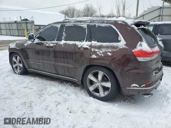 2015 Jeep Grand Cherokee Summit with VIN 1C4RJFJT6FC950774, listed as a Copart auction lot 88510105 with 205,012 mi miles and Salvage Title. Bid and sale history available at carsss.com. Image 2.