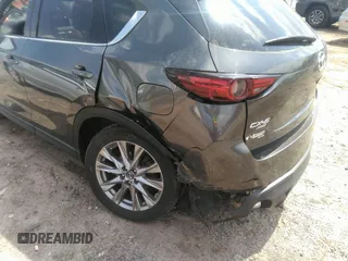 2019 Mazda CX-5 Grand Touring with VIN JM3KFBDM7K0606860, listed as a IAAI auction lot 41936338 with 93,057 mi miles. Bid and sale history available at carsss.com. Image 6.