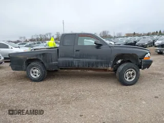 1999 Dodge Dakota SLT with VIN 1B7GG22Y6XS231301, listed as a IAAI auction lot 41427598 with Not Provided miles and . Bid and sale history available at carsss.com. Image 13.