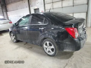 2012 Chevrolet Sonic LTZ z VIN 1G1JE5SH3C4151930, wystawiony jako Copart lot #84337574 z przebiegiem 125 606 mil mil oraz Szkoda całkowita • Salvage title. Historia ofert i sprzedaży dostępna na DreamBid. Obrazek 2.