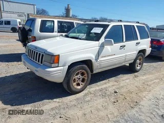 1997 Jeep Grand Cherokee Limited with VIN 1J4GZ78S9VC667698, listed as a IAAI auction lot 41671571 with 191,448 mi miles and . Bid and sale history available at DreamBid. Image 2.