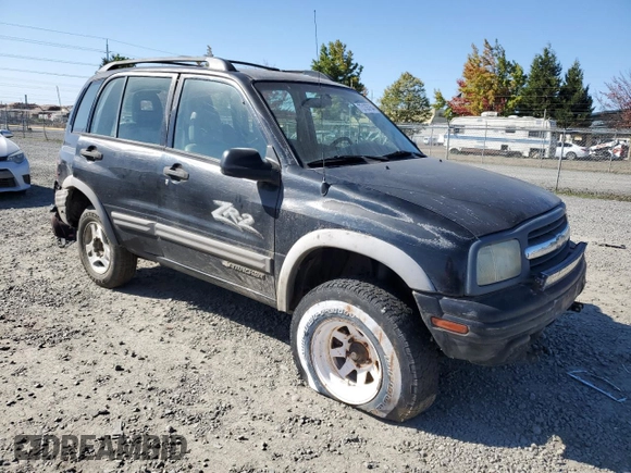 2002 Chevrolet Tracker ZR2 with VIN 2CNBJ734X26948098, listed as a Copart auction lot 73135754 with 234,627 mi miles and Salvage title. Bid and sale history available at DreamBid. Image 4.
