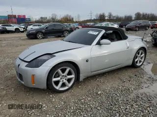 2004 Nissan 350Z Enthusiast with VIN JN1AZ36A74T013105, listed as a Copart auction lot 82797874 with Not Provided miles and Salvage Title. Bid and sale history available at carsss.com. Image 1.