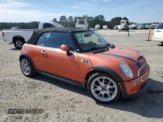 2006 MINI Convertible S with VIN WMWRH33576TF89127, listed as a Copart auction lot 49763365 with 150,446 mi miles and Salvage title. Bid and sale history available at DreamBid. Image 4.