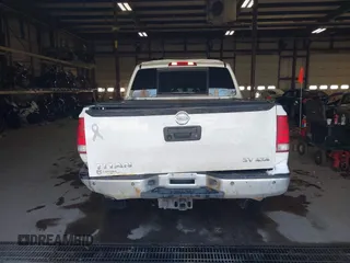 2014 Nissan Titan S with VIN 1N6AA0EC2EN512337, listed as a IAAI auction lot 41337837 with 187,540 mi miles and . Bid and sale history available at DreamBid. Image 16.