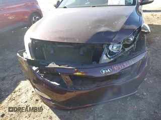 2015 Kia Optima LX with VIN 5XXGM4A79FG384762, listed as a IAAI auction lot 40919391 with 183,379 mi miles. Bid and sale history available at carsss.com. Image 6.