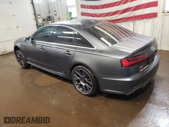 2016 Audi S6 Premium Plus z VIN WAUF2AFC4GN100284, wystawiony jako Copart lot #86496964 z przebiegiem 100 537 mil mil oraz Szkody całkowita. Historia ofert i sprzedaży dostępna na DreamBid. Obrazek 2.