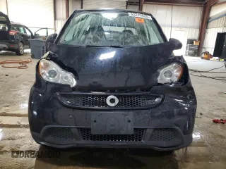2015 Smart fortwo Passion с VIN WMEEJ3BA6FK820446, выставлен на аукционе Copart как лот 63243635 с пробегом Не указан миль и Списание • Salvage title. История ставок и продаж доступна на DreamBid. Изображение 5.