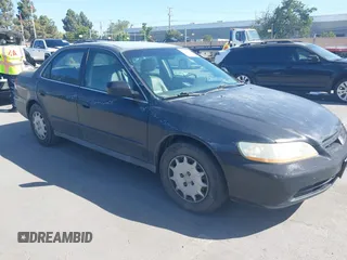 2001 Honda Accord LX z VIN 1HGCG65561A104084, wystawiony jako IAAI lot #42273127 z przebiegiem 399 995 mil mil oraz . Historia ofert i sprzedaży dostępna na DreamBid. Obrazek 1.