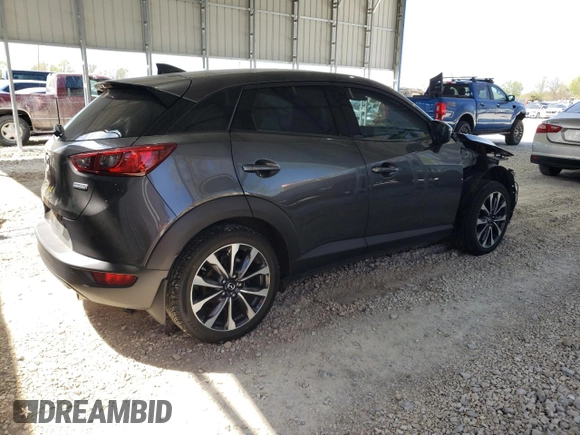 2019 Mazda CX-3 Touring z VIN JM1DKFC75K1439294, wystawiony jako Copart lot #52967955 z przebiegiem 16 966 mil mil oraz Czysty tytuł • Clean title. Historia ofert i sprzedaży dostępna na DreamBid. Obrazek 3.