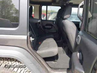 2019 Jeep Wrangler Unlimited Sport S with VIN 1C4HJXDG2KW516571, listed as a IAAI auction lot 42043223 with 58,131 mi miles and . Bid and sale history available at DreamBid. Image 8.