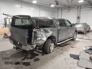 2013 Toyota Tundra 4WD Truck with VIN 5TFDW5F16DX305917, listed as a IAAI auction lot 41640555 with 255,812 mi miles. Bid and sale history available at carsss.com. Image 4.