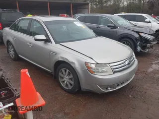2008 Ford Taurus SEL with VIN 1FAHP24W78G105183, listed as a IAAI auction lot 41441086 with 215,758 mi miles. Bid and sale history available at carsss.com. Image 1.