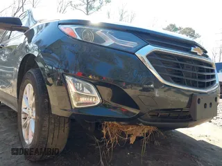 2020 Chevrolet Equinox LT z VIN 2GNAXUEV6L6158440, wystawiony jako IAAI lot #41626714 z przebiegiem 84 298 mil mil oraz . Historia ofert i sprzedaży dostępna na DreamBid. Obrazek 6.