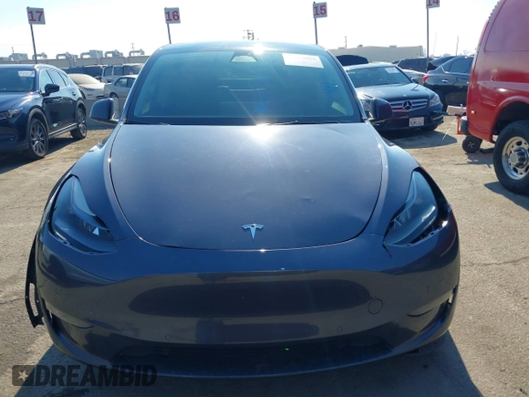 2022 Tesla Model Y Long Range z VIN 7SAYGDEE4NF522698, wystawiony jako IAAI lot #41287885 z przebiegiem 82 306 mil mil oraz . Historia ofert i sprzedaży dostępna na DreamBid. Obrazek 12.