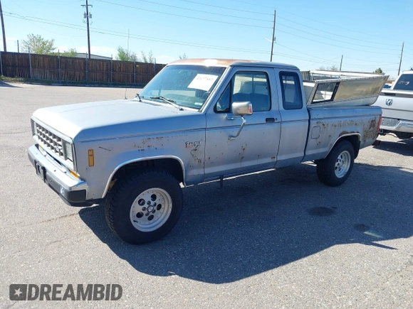 1987 Ford Ranger with VIN 1FTCR15T5HPB40124, listed as a IAAI auction lot 42177557 with 7,957 mi miles. Bid and sale history available at carsss.com. Image 2.