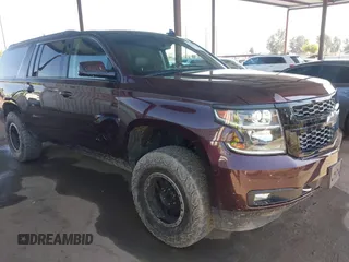 2017 Chevrolet Suburban LT z VIN 1GNSCHKC0HR351186, wystawiony jako IAAI lot #42202578 z przebiegiem 124 843 mil mil oraz . Historia ofert i sprzedaży dostępna na DreamBid. Obrazek 1.