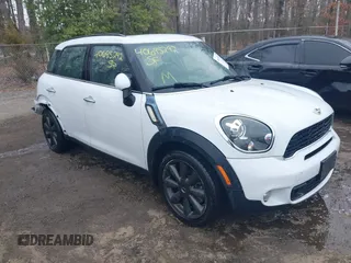 2014 MINI Countryman S with VIN WMWZC3C55EWP52138, listed as a IAAI auction lot 40695292 with 83,083 mi miles and . Bid and sale history available at DreamBid. Image 1.