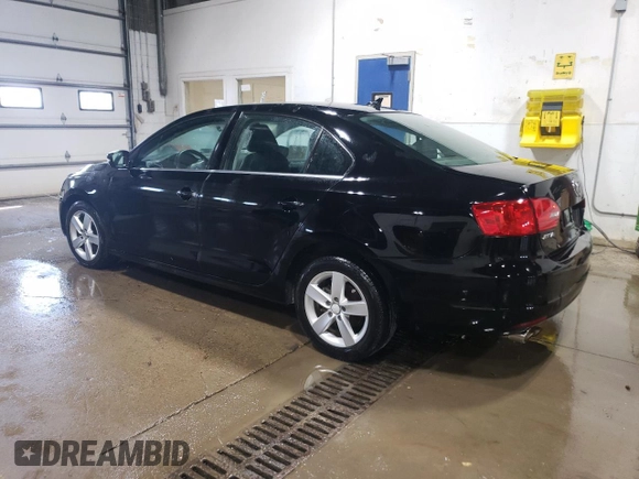 2011 Volkswagen Jetta TDI with VIN 3VWLL7AJXBM093417, listed as a Copart auction lot 57710435 with 104,484 mi miles and Clean title. Bid and sale history available at DreamBid. Image 2.