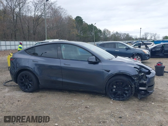2023 Tesla Model Y Long Range with VIN 7SAYGDEE3PA177437, listed as a IAAI auction lot 41813483 with 17,093 mi miles. Bid and sale history available at carsss.com. Image 14.