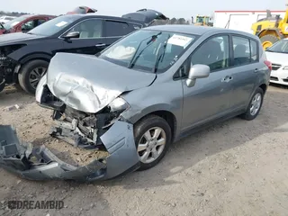 2012 Nissan Versa S with VIN 3N1BC1CPXCK803865, listed as a IAAI auction lot 41781565 with 217,650 mi miles. Bid and sale history available at carsss.com. Image 17.