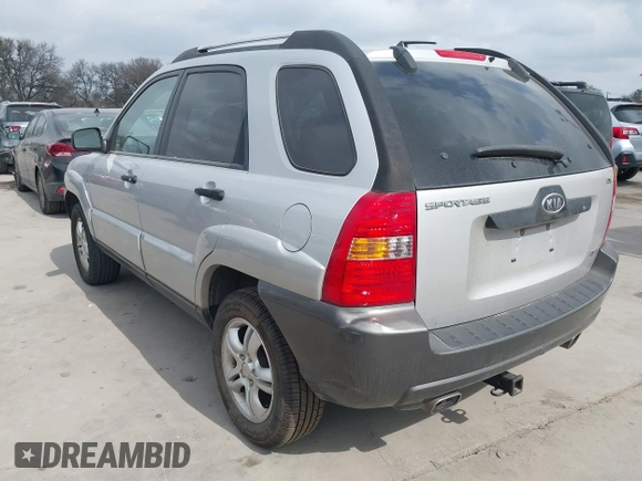 2005 Kia Sportage LX with VIN KNDJF723757087655, listed as a IAAI auction lot 41706354 with 164,736 mi miles and . Bid and sale history available at carsss.com. Image 3.