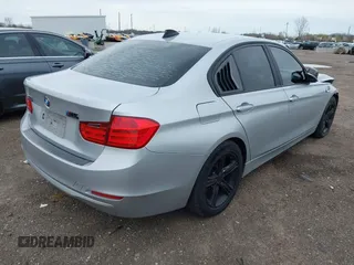 2014 BMW 3 Series 320i xDrive with VIN WBA3C3C58EP661364, listed as a IAAI auction lot 41947049 with 211,982 mi miles and . Bid and sale history available at DreamBid. Image 4.