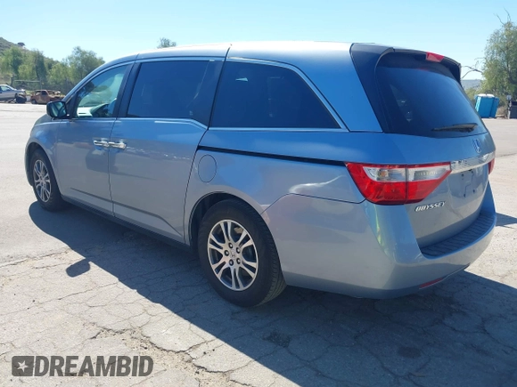 2012 Honda Odyssey EX-L with VIN 5FNRL5H69CB003067, listed as a IAAI auction lot 41862591 with 163,158 mi miles and . Bid and sale history available at carsss.com. Image 3.