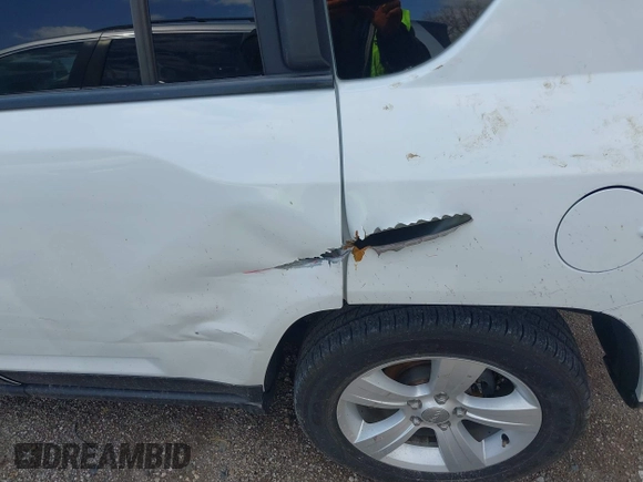 2016 Jeep Compass Latitude with VIN 1C4NJDEB1GD616457, listed as a IAAI auction lot 41962493 with 80,717 mi miles and . Bid and sale history available at DreamBid. Image 17.