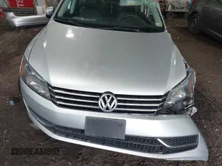 2014 Volkswagen Passat S with VIN 1VWAT7A33EC104563, listed as a IAAI auction lot 42471984 with 122,926 mi miles and . Bid and sale history available at DreamBid. Image 10.
