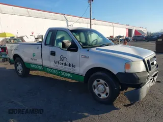2008 Ford F-150 XL with VIN 1FTRF12258KC54345, listed as a IAAI auction lot 41011640 with 167,840 mi miles. Bid and sale history available at carsss.com. Image 1.