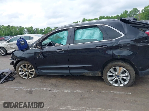 2020 Ford Edge Titanium z VIN 2FMPK4K98LBB12684, wystawiony jako IAAI lot #42134532 z przebiegiem 103 786 mil mil oraz . Historia ofert i sprzedaży dostępna na DreamBid. Obrazek 14.