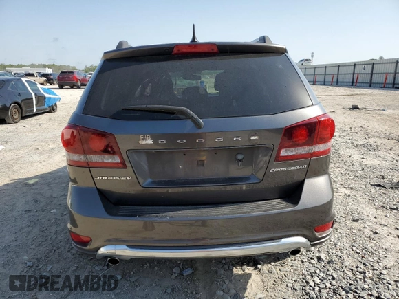 2016 Dodge Journey Crossroad z VIN 3C4PDCGG2GT131628, wystawiony jako Copart lot #56945375 z przebiegiem 126 587 mil mil oraz Szkoda całkowita • Salvage title. Historia ofert i sprzedaży dostępna na DreamBid. Obrazek 6.