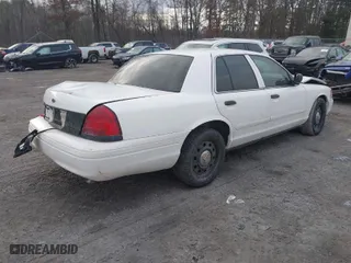 2006 Ford Police Interceptor with VIN 2FAHP71W76X102230, listed as a IAAI auction lot 41229172 with 113,899 mi miles. Bid and sale history available at carsss.com. Image 4.
