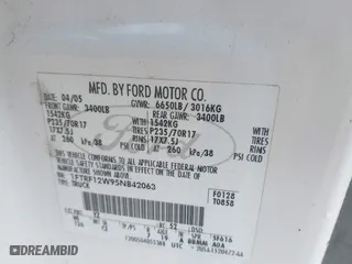 2005 Ford F-150 XL with VIN 1FTRF12W95NB42063, listed as a IAAI auction lot 41874938 with 254,029 mi miles. Bid and sale history available at carsss.com. Image 9.