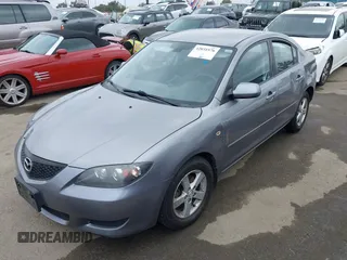 2006 Mazda 3 i with VIN JM1BK12F261420775, listed as a IAAI auction lot 42031576 with 145,530 mi miles. Bid and sale history available at carsss.com. Image 2.