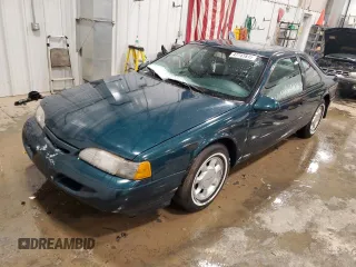 1995 Ford Thunderbird LX with VIN 1FALP62W8SH205542, listed as a Copart auction lot 47741815 with 128,401 mi miles and Clean Title. Bid and sale history available at DreamBid. Image 1.