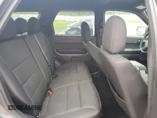 2011 Ford Escape XLT с VIN 1FMCU0D71BKC40590, выставлен на аукционе Copart как лот 58641865 с пробегом 95 211 миль миль и Списание • Salvage title. История ставок и продаж доступна на DreamBid. Изображение 11.