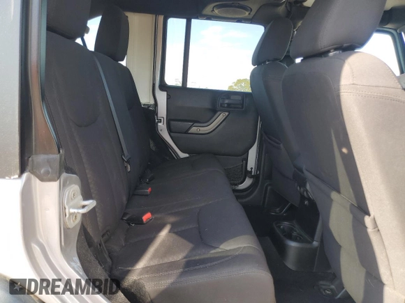 2013 Jeep Wrangler Unlimited Sport z VIN 1C4BJWDG7DL597491, wystawiony jako Copart lot #50719435 z przebiegiem Nie podano mil oraz Szkoda całkowita • Salvage title. Historia ofert i sprzedaży dostępna na DreamBid. Obrazek 11.