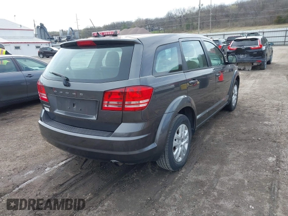 2014 Dodge Journey American Value with VIN 3C4PDCAB7ET151254, listed as a IAAI auction lot 41962026 with 161,115 mi miles and . Bid and sale history available at DreamBid. Image 4.