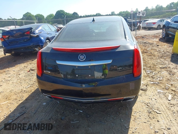 2014 Cadillac XTS Luxury with VIN 2G61M5S30E9229758, listed as a IAAI auction lot 42179952 with 125,848 mi miles and . Bid and sale history available at DreamBid. Image 16.