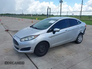 2014 Ford Fiesta S with VIN 3FADP4AJ6EM211807, listed as a IAAI auction lot 42601443 with 163,459 mi miles and . Bid and sale history available at DreamBid. Image 2.