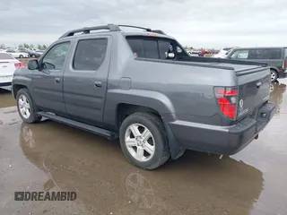 2014 Honda Ridgeline RTL with VIN 5FPYK1F50EB002577, listed as a IAAI auction lot 41931258 with 147,665 mi miles. Bid and sale history available at carsss.com. Image 3.