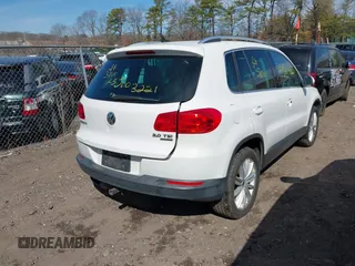 2012 Volkswagen Tiguan S with VIN WVGBV7AX0CW582922, listed as a IAAI auction lot 41906974 with 150,681 mi miles and . Bid and sale history available at DreamBid. Image 4.